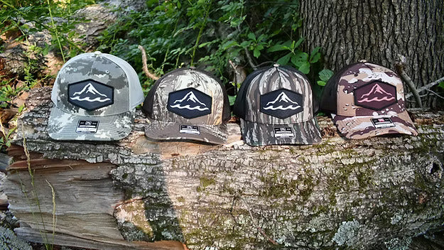 Camo branded trucker hat with dye-sublimated patch