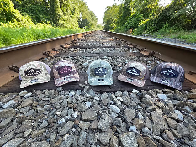 Camo branded trucker hat with dye-sublimated patch