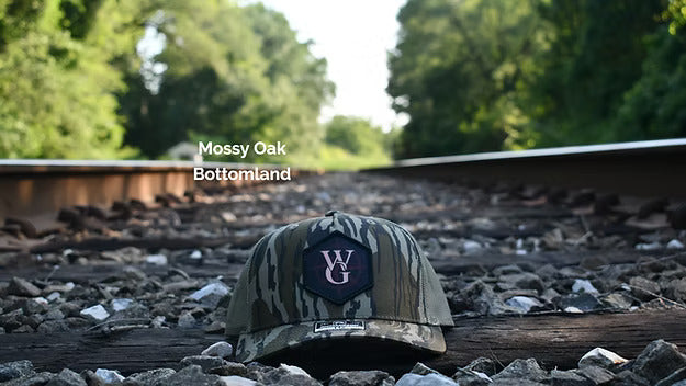 Camo branded trucker hat with dye-sublimated Compass patch