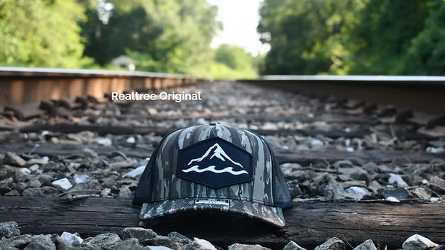 Camo branded trucker hat with dye-sublimated patch