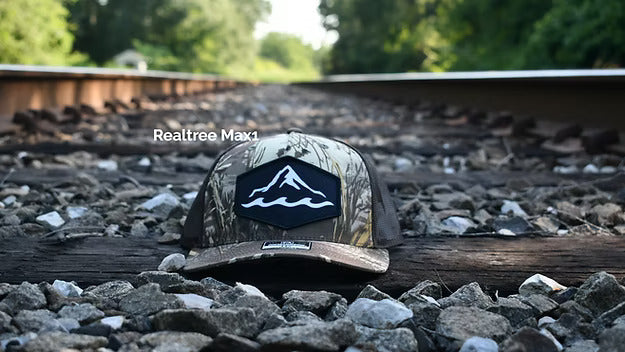 Camo branded trucker hat with dye-sublimated patch